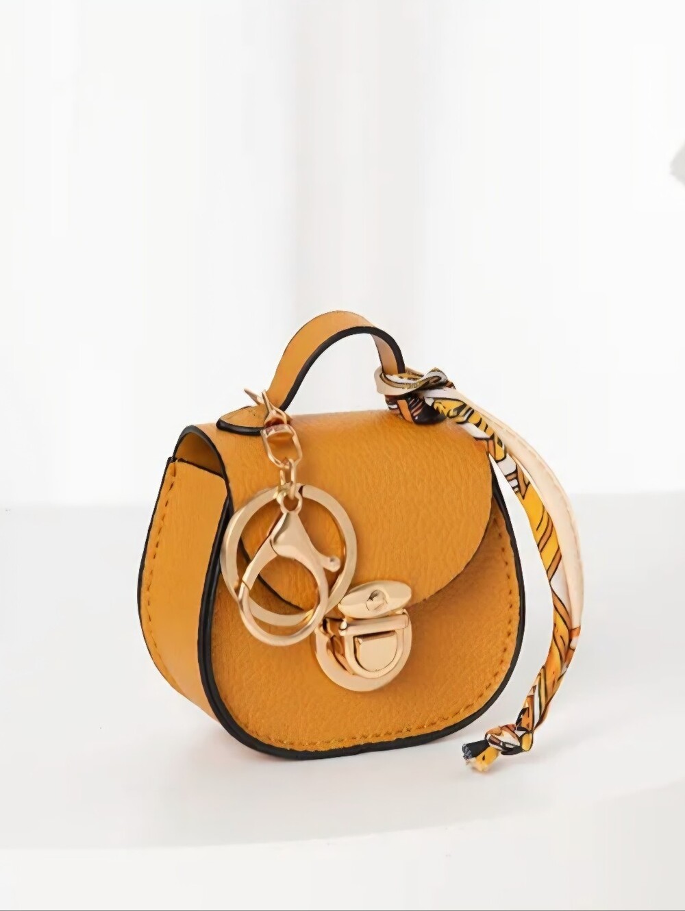 Tumeric Yellow Mini Saddle Bag Charm/Ear Bud Holder with Gold Accents NEW